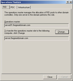  This figure shows the Operations Masters dialog box, which contains the Change button for transferring the operations master role to another domain controller.
